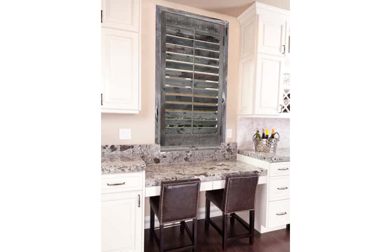 Reclaimed wood shutters on kitchen window in Hartford